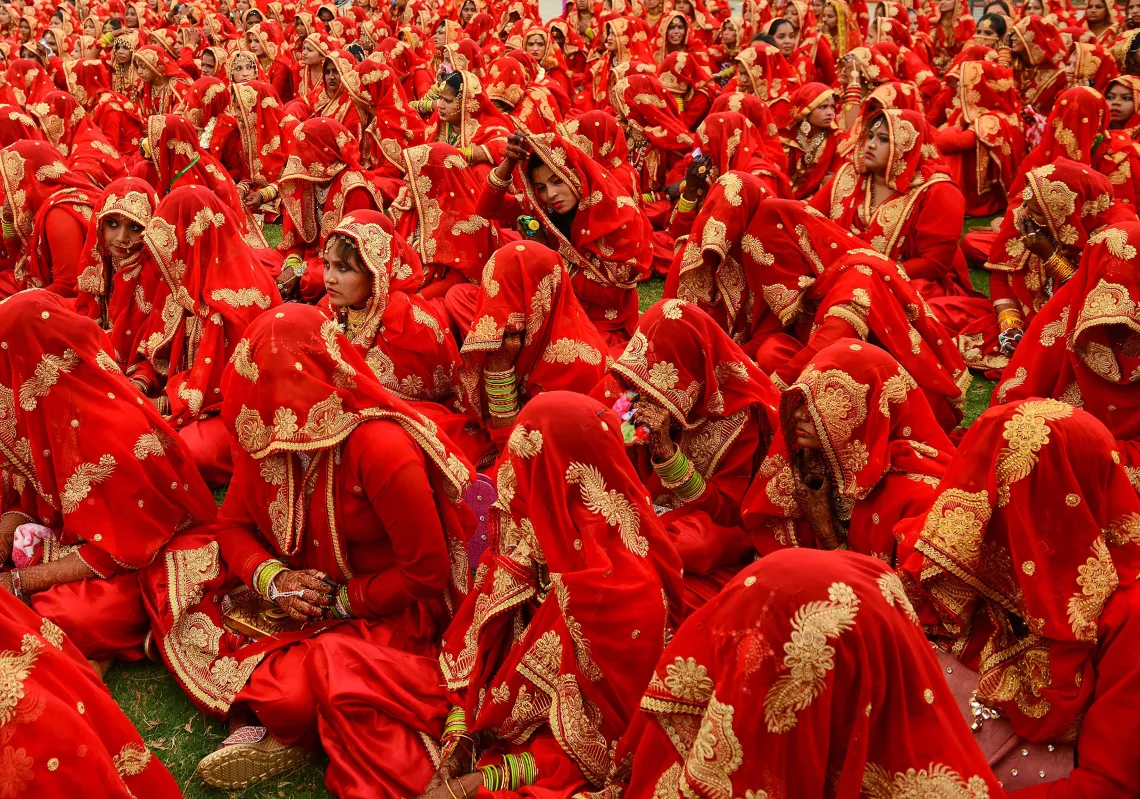 Indian Muslim brides-to-be gather as they participate in a mass wedding ceremony in Ahmedabad on March 3, 2019. (Getty)